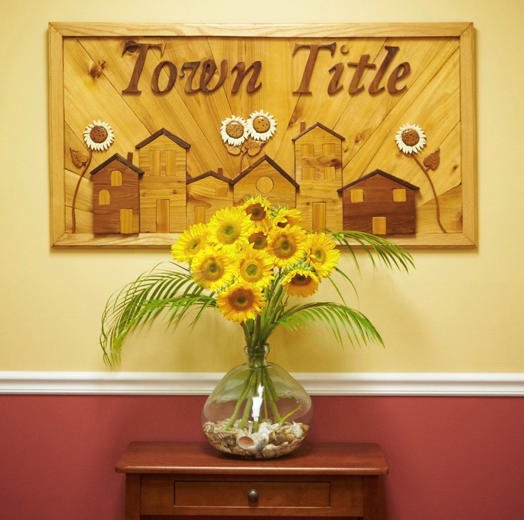 Town Title Sign w Sunflowers in Vase CLOSEUP